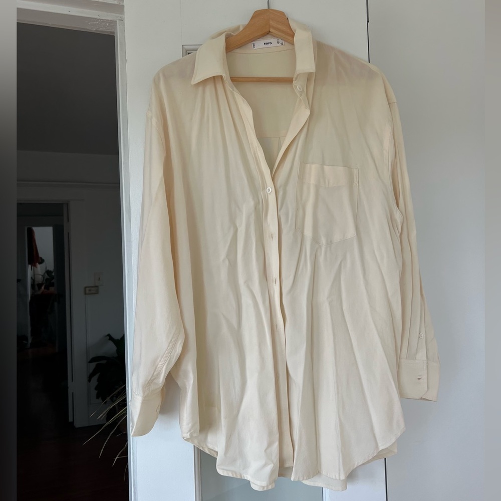 Cream colored button-down blouse from Mango - size medium